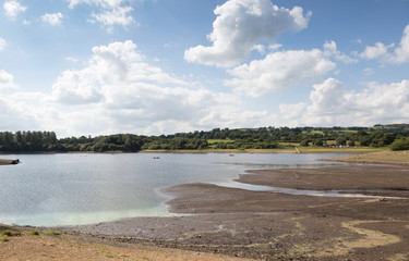 View of Tittesworth Water, a reservoir near Leek in Staffordshire with  low level water level.
