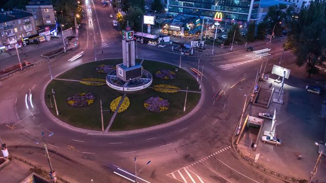 Aerial time lapse of city traffic at 95th district