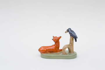The crow and the fox and the cheese - fable theme ceramic figurine