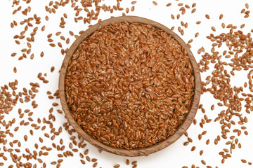 Flax seeds in the wooden bowl