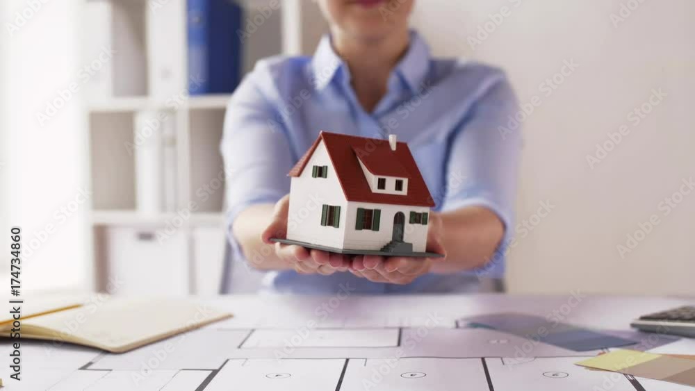 Poster female architect with house model and blueprint