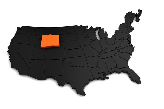 United States of America, 3d black map, with Wyoming state highlighted in orange. 3d render