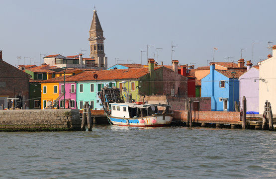 view of the town of Burano near Venice with a fishing tackle fro