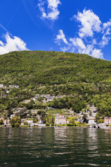 Fototapeta na wymiar View at town Carate on Como Lake in Italy