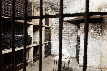 the inner part of an old wine cellar, storage place