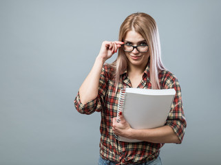 Young attractive woman hold book