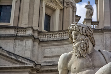 Fototapeta na wymiar Roman Ancient Statue Fountain Detail Face God Italian