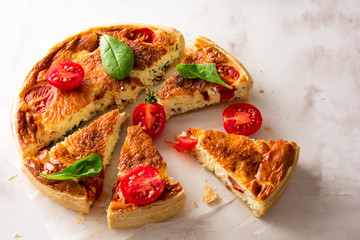 Homemade Cheesy Egg Quiche for Brunch with Spinach and Tomato