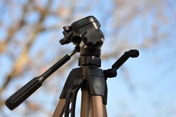 Tripod in blue sky