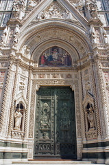 Main Gate of the Cathedral of Saint Mary of the Flower (Cattedrale di Santa Maria del Fiore, Duomo) in Florence (Firenze), Italy