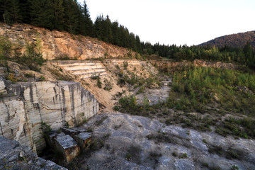 Marble quarry with a mountain landscape surrounded by nature