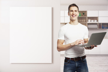 Cheerful man in kitchen