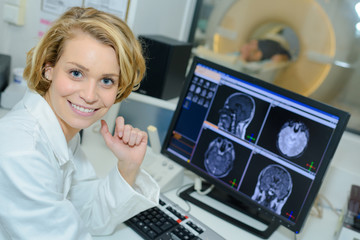 Fototapeta na wymiar happy woman doctor looking at x ray