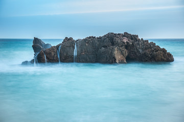  A curious rock in the sea shaped like a shark