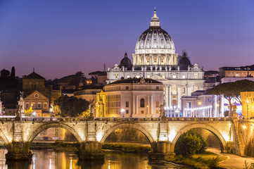 Naklejka na ściany i meble Rome, Italy. Vatican dome of Saint Peter Basilica (San Pietro) and Sant'Angelo Bridge, over Tiber river at dusk. One of the most famous view in the World