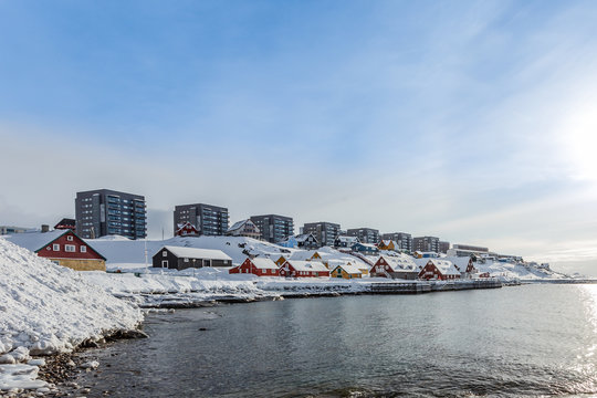 Nuuk old harbor view with modern building at the bay