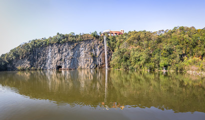 Fototapeta na wymiar Viewpoint and waterfall at Tangua Park - Curitiba, Brazil
