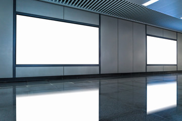 big horizontal poster on metro station.