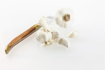 Garlic (Allium sativum) with knife
