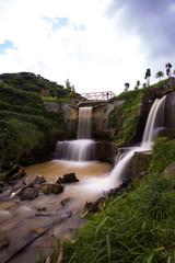 scenery of waterfall at tea plantation,cameron highland Malaysia at noon. soft focus,blur due to long exposure