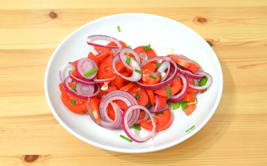 Vegetable salad on plate.
