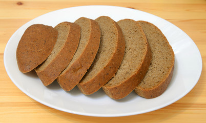 Sliced bread on plate.