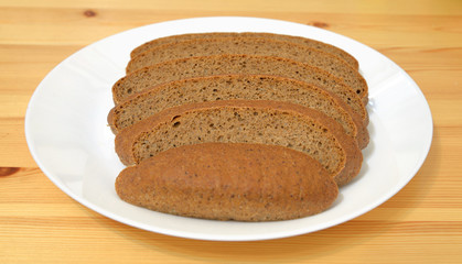 Sliced bread on plate.
