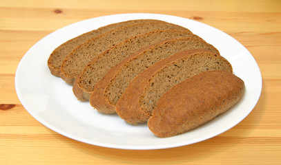 Sliced bread on plate.