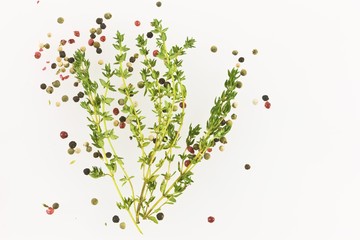 Thyme (Thymus vulgaris), with red and black pepper