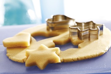 Cutting out shortcrust pastry, star and heart