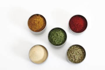 Various kinds of spices in cans