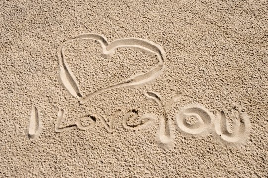 Heart in the sand, "I love you"