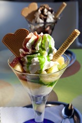 Fruit sundae with whipped cream