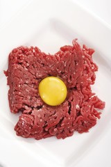 Tartare with egg yolk