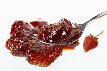 Strawberry jam with a spoon