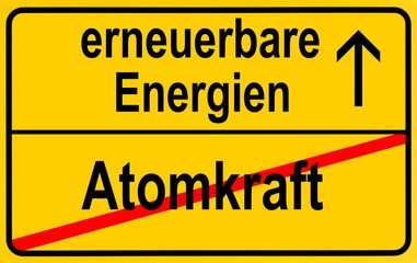 Symbolic image in the form of a town sign, in German, exit from atomic power, entrance into renewable energy sources