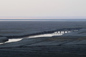 Salt marshes in Westerhever after sunset, Schleswig-Holstein, Germany, Europe