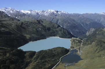 Fototapeta na wymiar View of the Stausee Kops storage lake, Zeinisjoch mountain, 1822 m and Silvretta mountain range, Tyrol, Austria, Europe