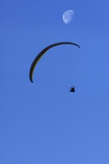 Paraglider with moon