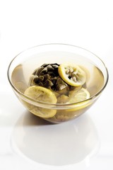 Boiled Artichoke with lemon slices