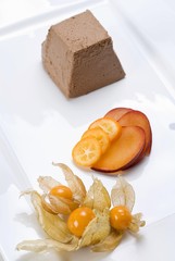 Dessert, plums, kumquats, physalises, mousse au chocolat