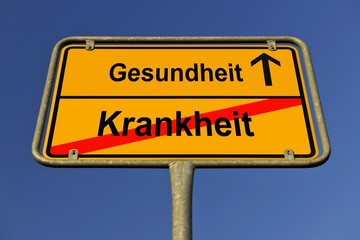 City limit sign, symbolic image for the way from Krankheit to Gesundheit, German for going from being sick to regaining health
