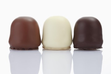 Chocolate-coated marshmallow treats with different coatings