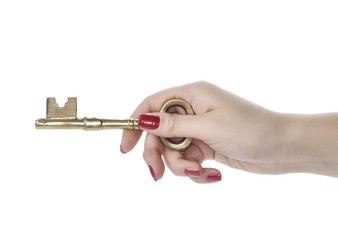 Woman holding a key in her hand