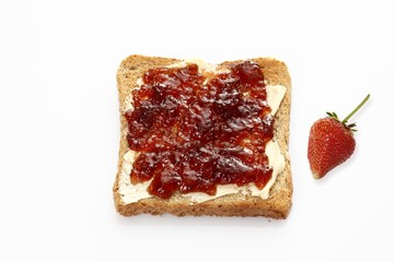 Slice of toast with strawberry jam