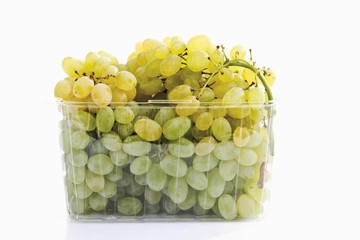 Green grapes in plastic packaging