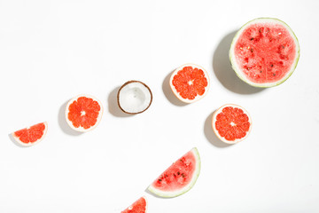 Creative layout made of watermelon, coconut and grapefruit