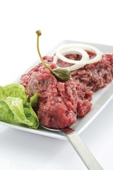 Tartare, caper fruit, onion rings