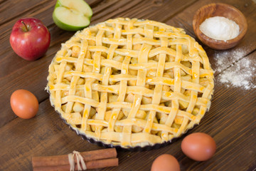 Raw American pie ready for cooking. Necessary ingredients for pie preparation