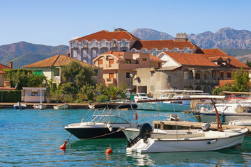Fototapeta na wymiar View of Mediterranean town of Tivat near natural marina Kalimanj. Montenegro